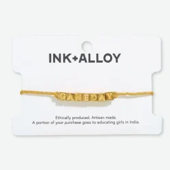 INK + ALLOY Goldie Gold Lurex Cord With Brass Letters Adjustable Gameday