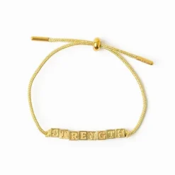 INK + ALLOY Goldie Gold Lurex Cord With Brass Letters Adjustable Strength