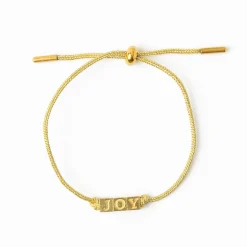 INK + ALLOY Goldie Gold Lurex Cord With Brass Letters Adjustable Joy