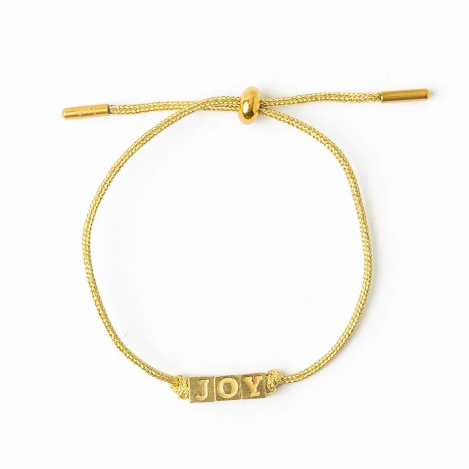 INK + ALLOY Goldie Gold Lurex Cord With Brass Letters Adjustable Joy