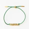INK + ALLOY Goldie Green Lurex Cord With Brass Letters Adjustable Lucky